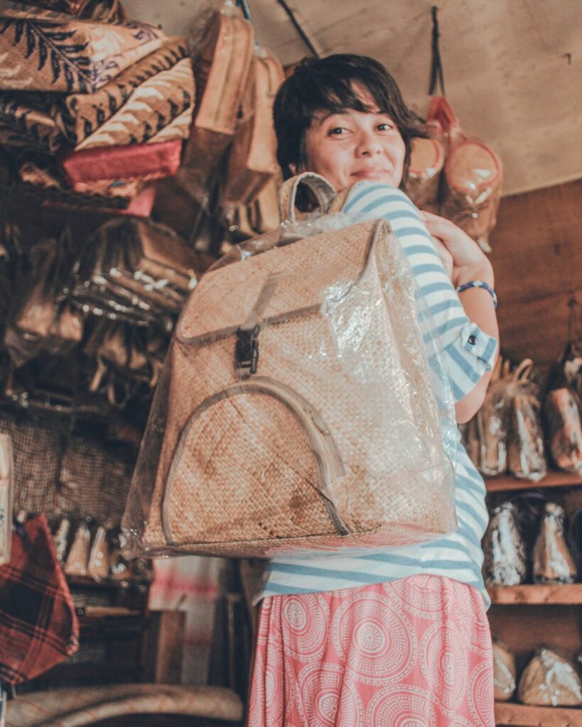 a woman carrying woven backpack from Basey, Samar