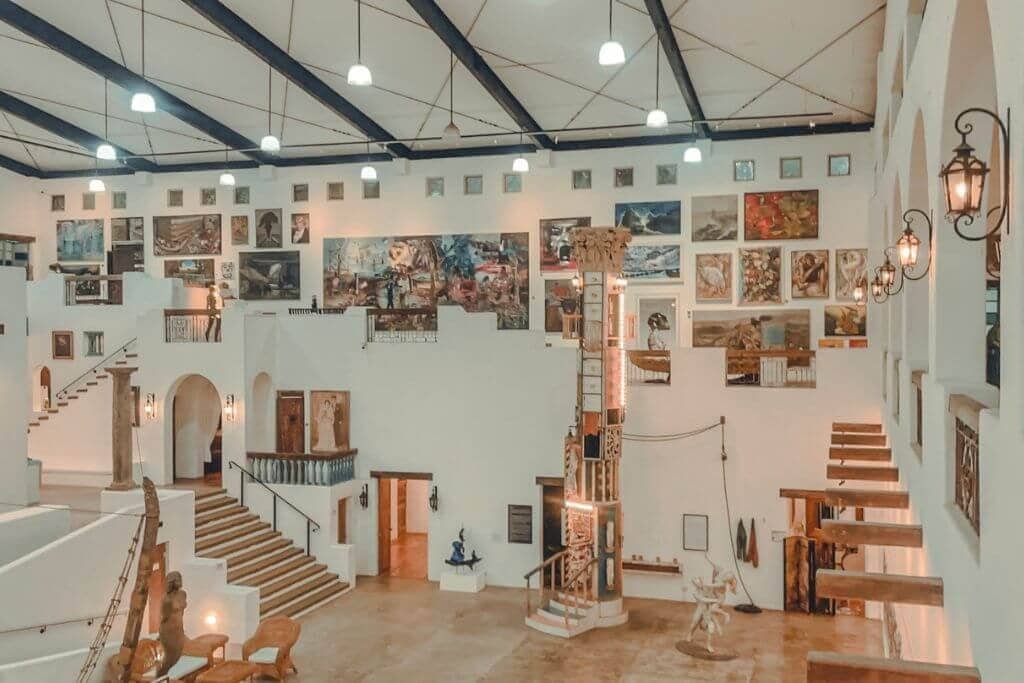One of Pinto Art Museum's grand gallery halls, lined floor to ceiling with Filipino contemporary art