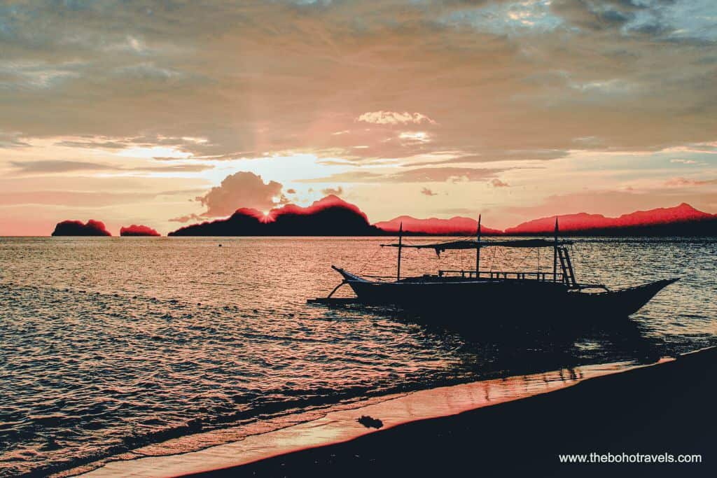 sunset at 7th commando beach, one of the best things to do in el nido