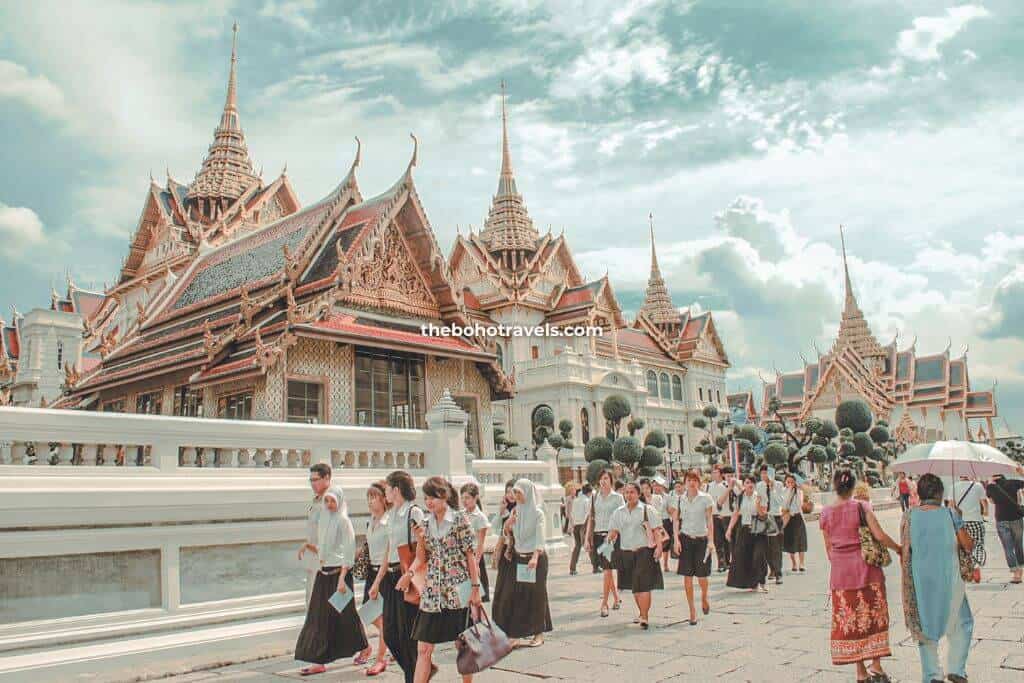 young and adult tourists visiting the Grand Palace, one of the best things to do in Bangkok