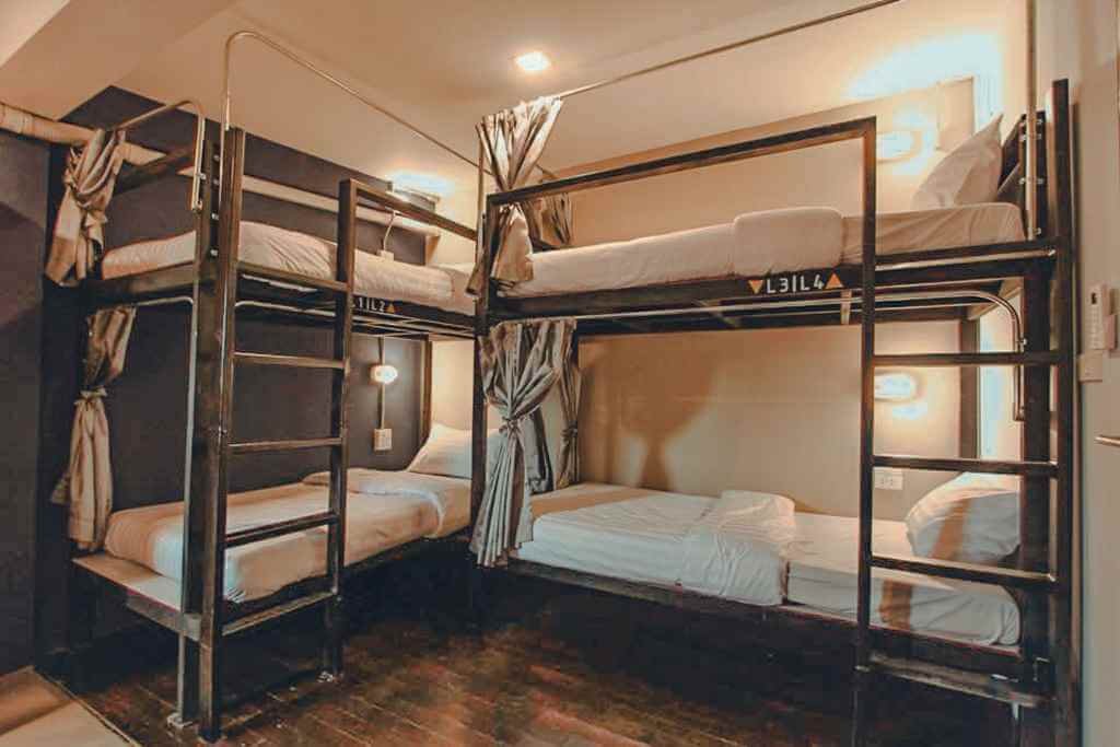 Bunk beds in a hostel dorm room in Chiang Mai Old City — where to stay in Chiang Mai for budget travelers